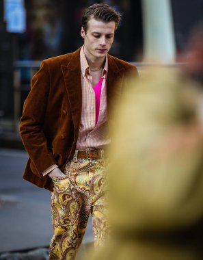 MILAN, Italy- January 16 2022: Hugh Laughton-Scott on the street in Milan.