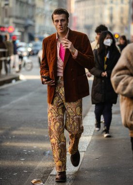 MILAN, Italy- January 16 2022: Hugh Laughton-Scott on the street in Milan.