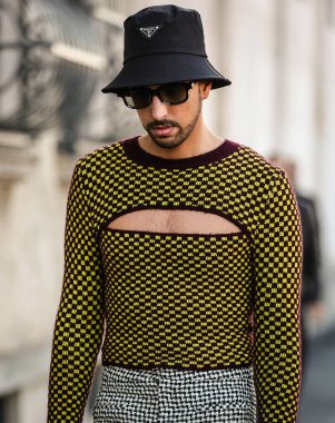MILAN, Italy- January 16 2022: Men on the street in Milan.