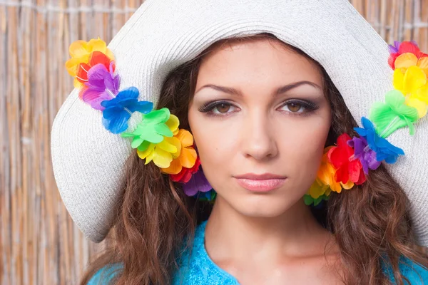 Young woman in a hat — Stock Photo, Image