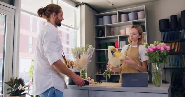 Positive Woman Florist Passing Bouquet Male Customer Crossing Hands Flower — Stockvideo