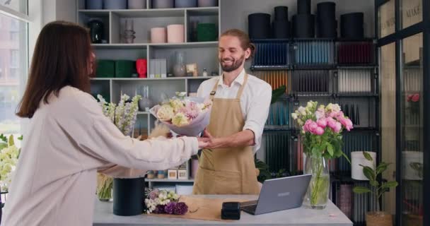 Happy Male Florist Seller Flower Shop Sells Bouquet Flowers Female — Stok video