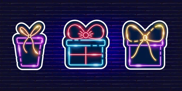Hediye kutusu neon etiketleri ayarlandı. Parlayan bayram hediyesi ikonu. Yeni yıl ve Noel konsepti. Tasarım için vektör illüstrasyonu