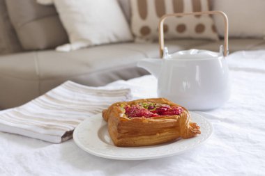 Sweet dessert with afternoon tea time. Neutral afternoon lifestyle composition. Beige linen tablecloth. Afternoon tea concept.