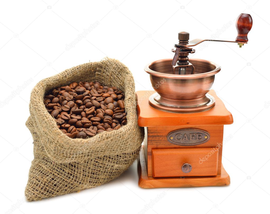 Coffee beans and hand grinder