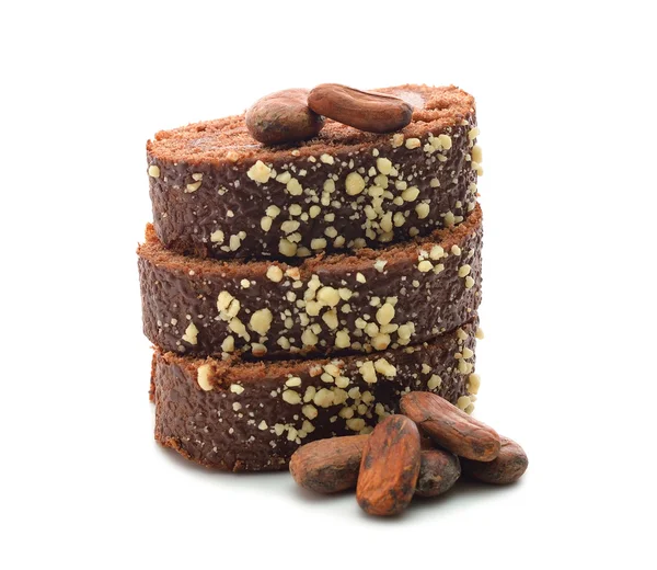 Schokoladenkuchen und Kakaobohnen — Stockfoto