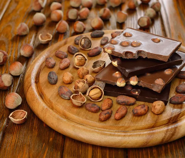 Chocolate with hazelnuts — Stock Photo, Image