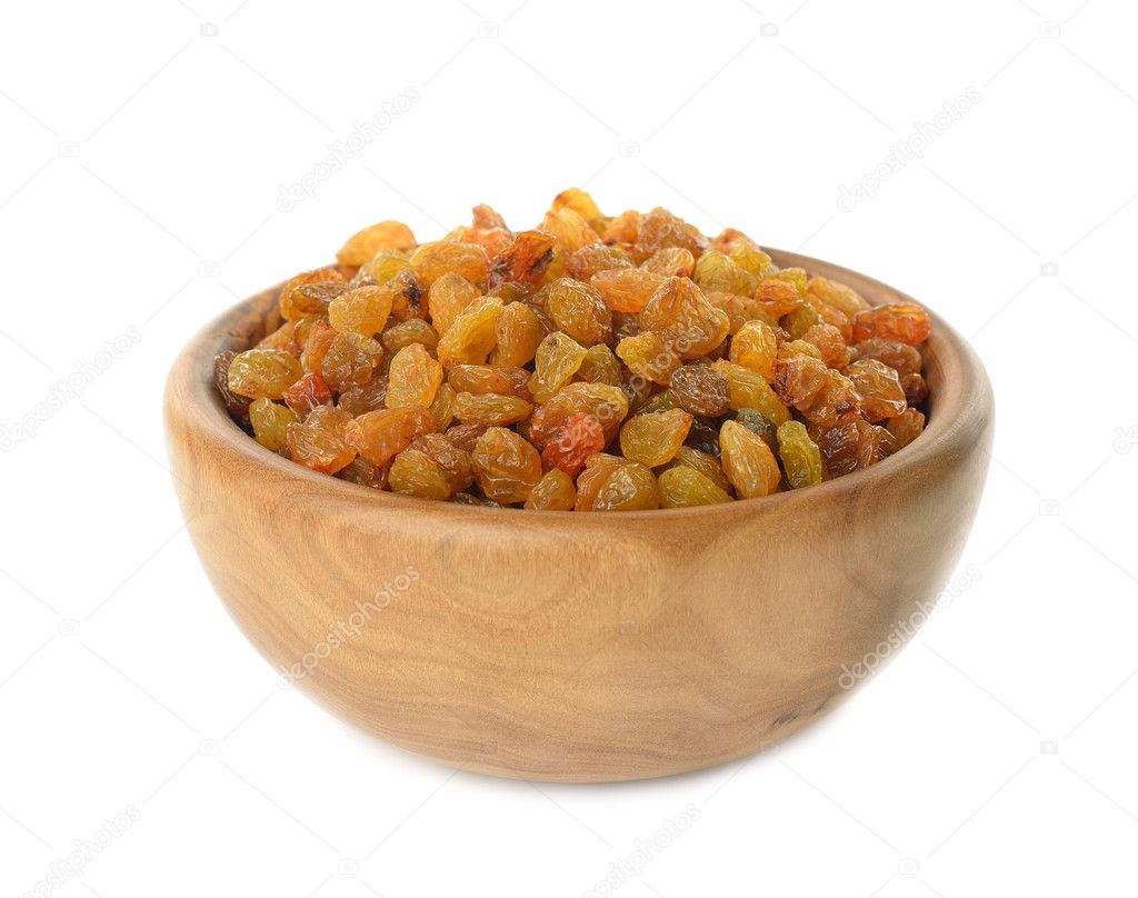 Raisins in a wooden bowl