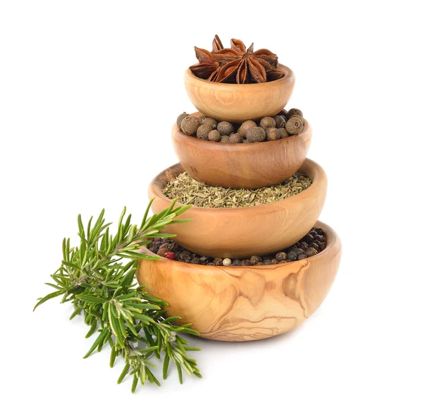 Spices in a wooden bowl — Stock Photo, Image