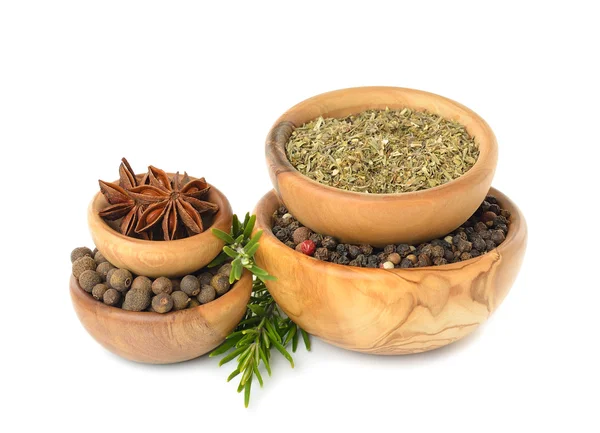 Spices in a wooden bowl Stock Picture