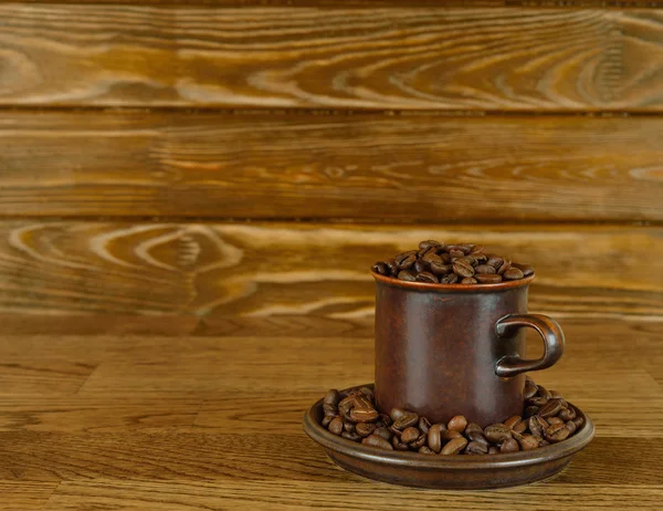 Granos de café en una taza — Foto de Stock