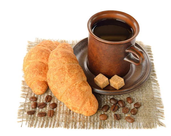 Croissant en kopje koffie — Stockfoto