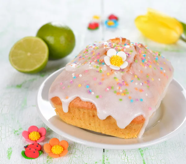 Lime cupcake decorated with glaze — Stock Photo, Image