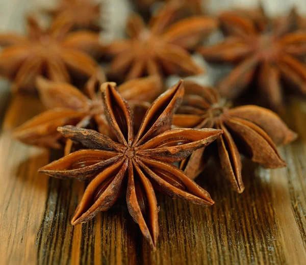 Anise on a brown table — Stock Photo, Image