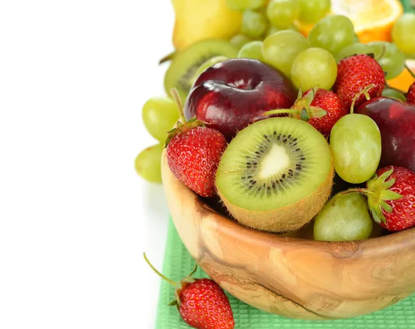 Frutas em tigela de madeira — Fotografia de Stock