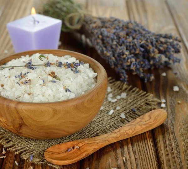 Sea salt with lavender in a wooden bowl — Stock Photo, Image
