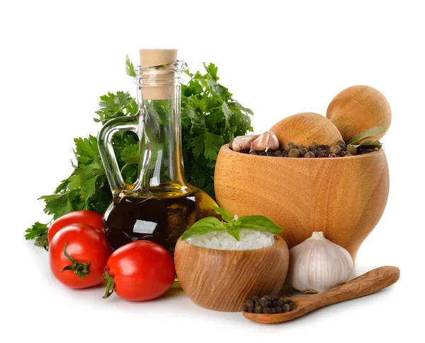 Mortar with spices, olive oil and fresh vegetables — Stock Photo, Image