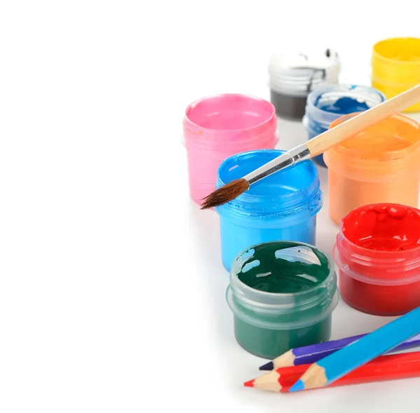 Colorful paints and pencils — Stock Photo, Image