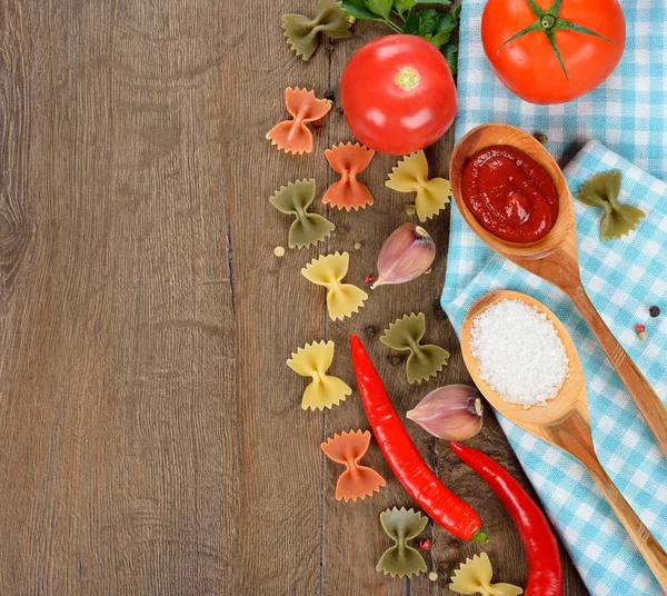 Pasta, spices and vegetables — Stock Photo, Image