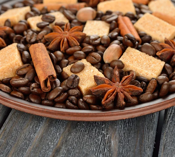 Coffee beans, sugar and spices — Stock Photo, Image