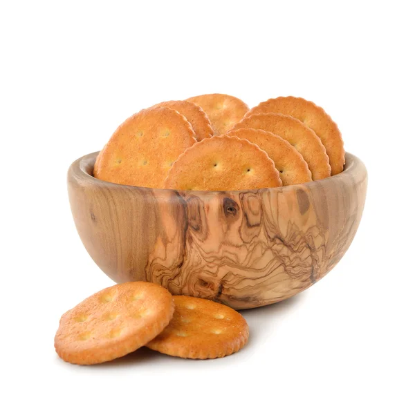 Crackers in a wooden bowl — Stock Photo, Image