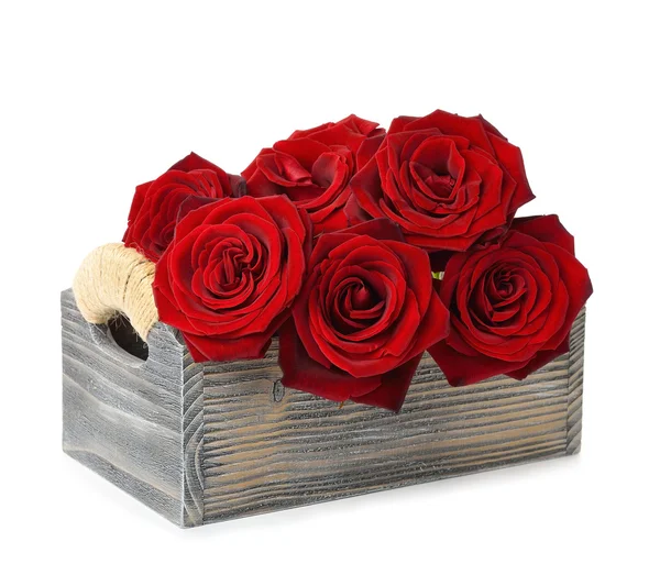 Røde roser i en trekasse – stockfoto