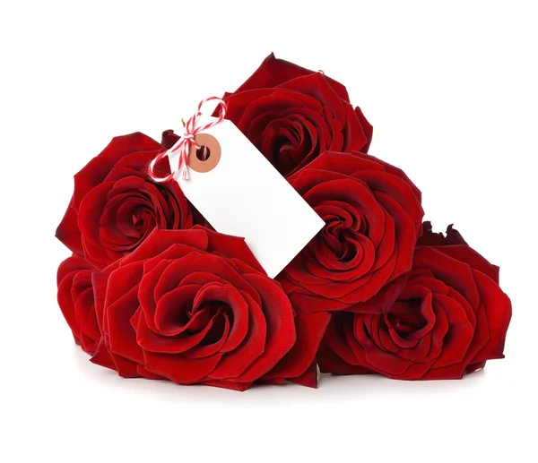 Boeket van rode rozen met een label — Stockfoto
