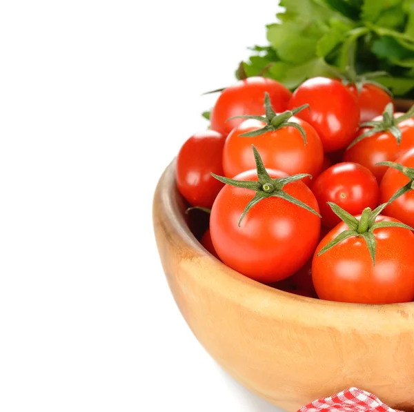 Tomatoes in a wooden bowl — Stock Photo, Image