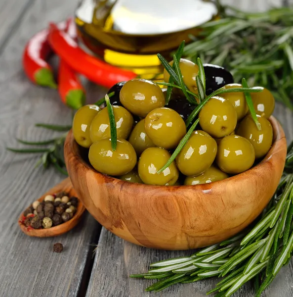 Olives with rosemary — Stock Photo, Image