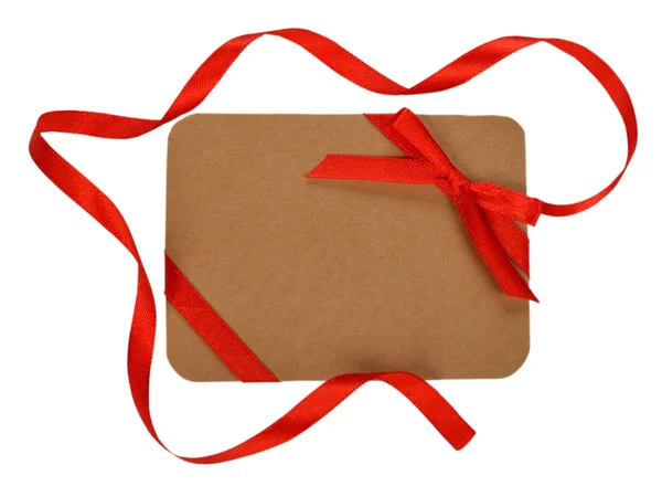Cardboard card decorated with red ribbon — Stock Photo, Image
