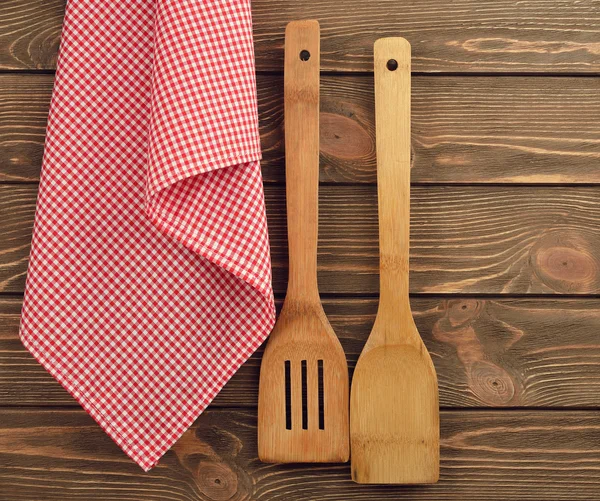 Wooden spoon and napkin — Stock Photo, Image