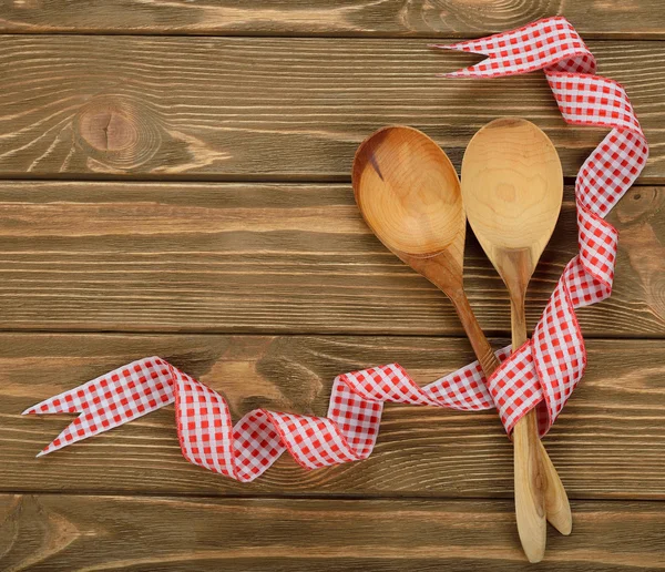 Wooden spoons decorated with ribbon — Stock Photo, Image