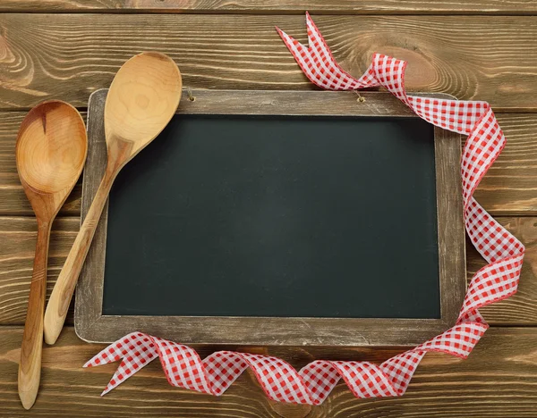 Schreibtafel und Löffel — Stockfoto