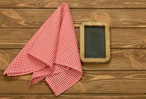 Writing board and napkin — Stock Photo, Image