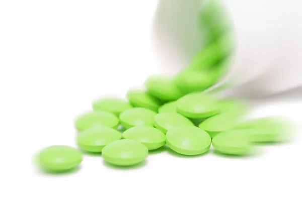Pillole di droga versate da un barattolo (effetto zoom ) — Foto Stock