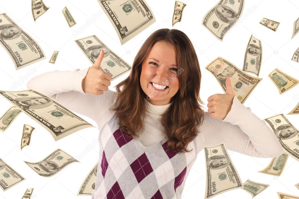 Successful girl on falling dollars background