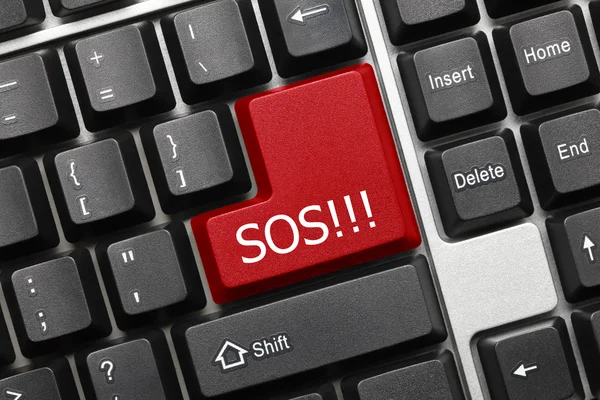 Conceptual keyboard - SOS (red key) — Stock Photo, Image