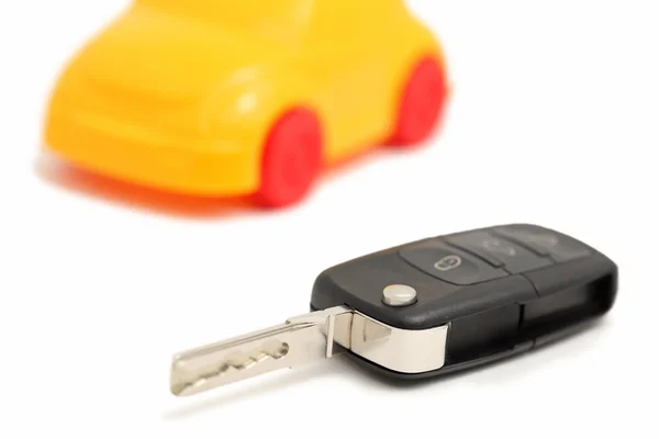 Auto remote control-toets en auto (geïsoleerd) — Stockfoto