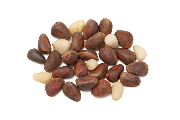 Cedar nuts on white background — Stock Photo, Image