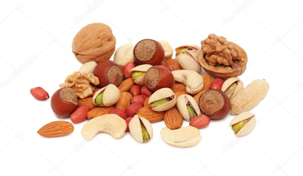 Pile from different nuts on white background