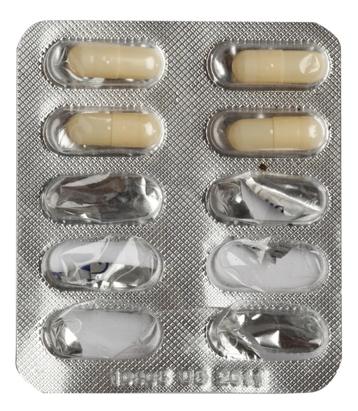 Pilules en plaquette thermoformée isolée sur fond blanc — Photo