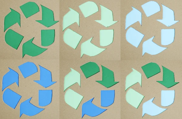 Recycle symbol on cardboard texture — Stock Photo, Image