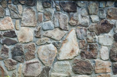 Arka planda iyi yontulmuş taşlar farklı boyutlarda, düz yüzey eski duvar, yakın plan eski doku arka plan.