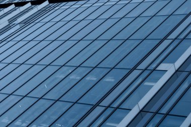 Abstract modern building background for design, office building facade with large glass windows
