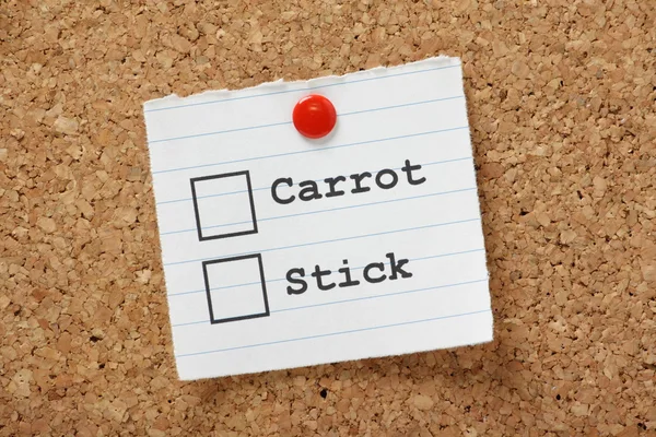 Carrot or Stick method? — Stock Photo, Image