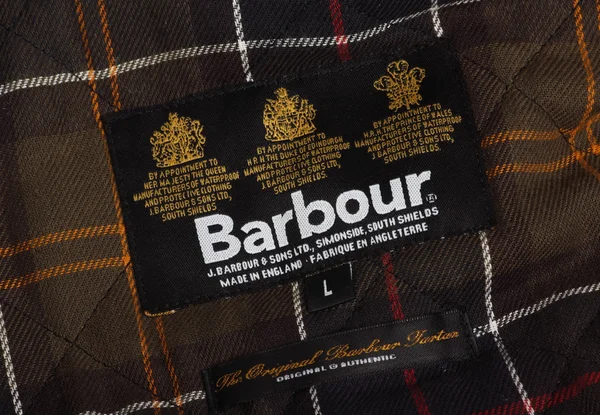 Barbour label a tartan — Stock fotografie