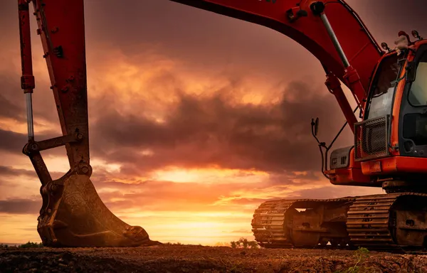 Backhoe Parked Construction Site Digging Soil Bulldozer Sunset Sky Clouds — Stock Photo, Image