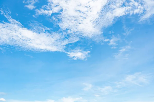 Beautiful blue sky and white clouds abstract background. Cloudscape background. Blue sky and fluffy white clouds on sunny day. Nature weather. Beautiful blue sky for happy day background. Summer sky.