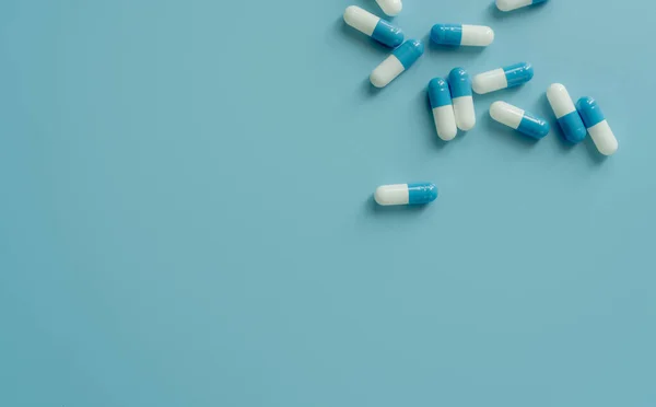 Top View Blue White Antibiotic Capsule Pills Blue Background Prescription — Foto de Stock