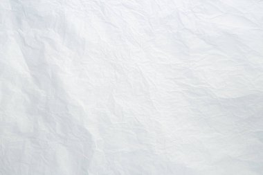 White crumpled paper texture background. White old creased and wrinkled paper abstract background. Grunge texture surface paper page material for vintage design. Manuscript letter paper. White sheet.